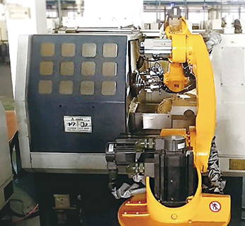 汽車零部件加工產(chǎn)線三臺(tái)數(shù)控機(jī)床上下料